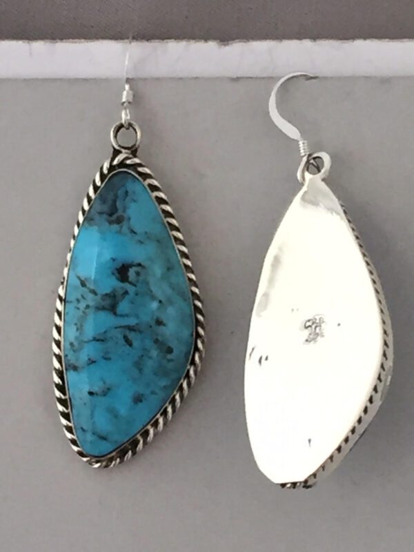 A Turquoise Drop Shaped Earring Pair Front and Back