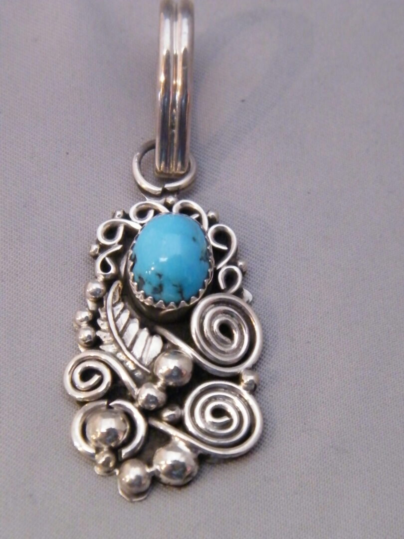 Sterling Silver Pendant Wind Pattern Turquoise Shirley Largo