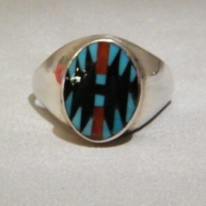 A Blue and Black Design Ring With Silver Band