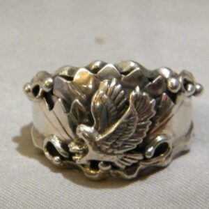 A Sterling Silver Ring With a Flying Bird