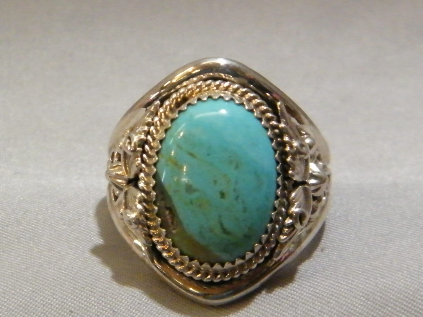 A Silver Color Ring With an Oval Color Ring
