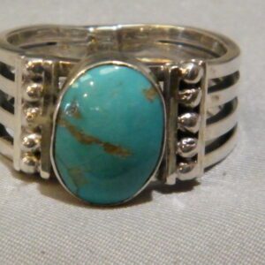 A Native American Indian Grace Four Band Turquoise Ring