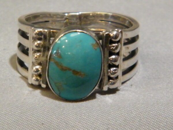 A Native American Indian Grace Four Band Turquoise Ring